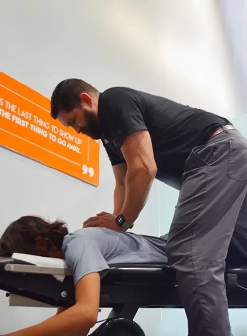 Chiropractor-Phoenix-AZ-NuSpine-Dr-Juan-Alvarez-Client-Adjustment-Circle.webp